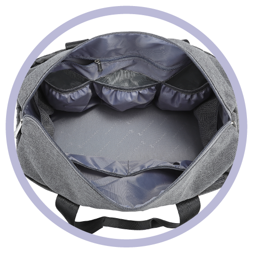inside of a gray tote bag that has many compartments for storage and organization