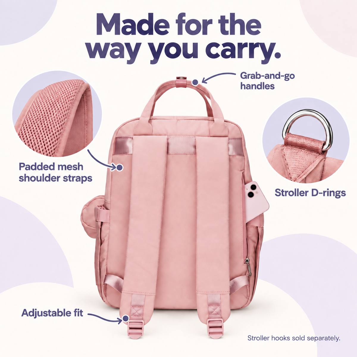 Pink diaper backpack with padded adjustable mesh shoulder straps, carry handles and stroller D-rings; stroller hooks sold separately