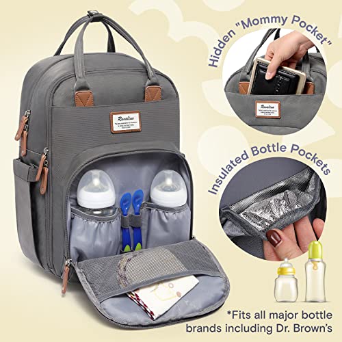 a grey backpack with a bottle inside with text: 'Pocket" Insulated *Fits all major bottle brands including Dr. Brown's'