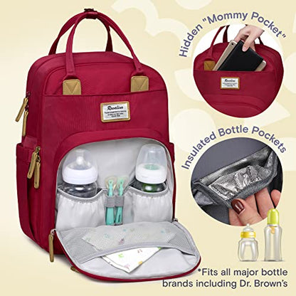 a red diaper bag with a bottle inside with text: 'Pocket" Hidden "M Insulated Bottle Pockets *Fits all major bottle brands including Dr. Brown's'