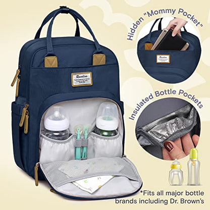 a blue diaper bag with a bottle inside with text: 'Pocket" Hidden "Mommy Insulated Bottle Pockets *Fits all major bottle brands including Dr. Brown's'