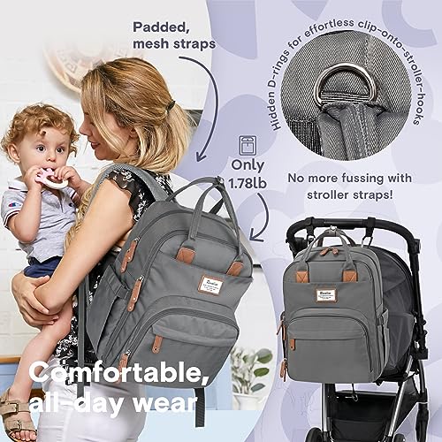 a person carrying a baby in a backpack with text: 'Padded, mesh straps effortless cl -on stroller-hooks Only 1.78lb No more fussing with stroller straps! Comfortable, wear'