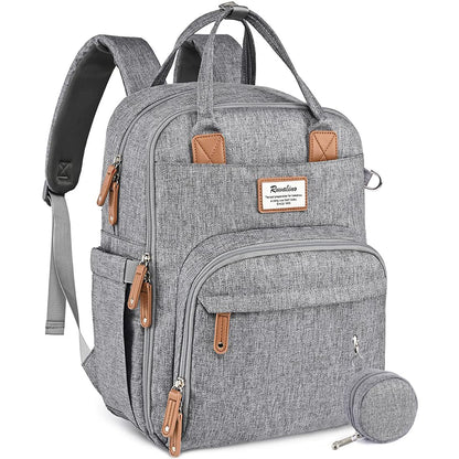 a grey backpack with brown straps with text: 'Ruvalino'